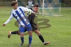 Kreisliga - Saison 2025/26- SV Karlshuld - SV Menning - Marcel Hubner schwarz Menning  - Yannik Werle weiss Karlshuld - Foto: Meyer Jürgen