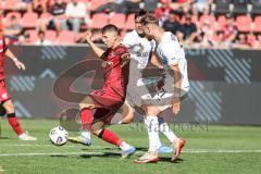3. Liga; FC Ingolstadt 04 - SV Wehen Wiesbaden; Zweikampf Kampf um den Ball Gustav Christensen (24, FCI) Wohlers Ole (21 SVWW)