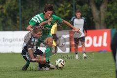 Bezirksliga - Saison 2025/26 - TSV Ober./Unterhaunstadt - SVA Palzing - Florian Diegel (Nr.10 - TSV Ober-/Unterh.stadt) - Marcel Radlmaier grün Palzing - Foto: Meyer Jürgen