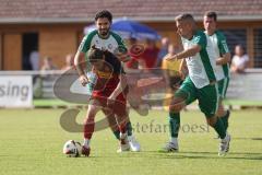 Freundschaftsspiel- Saison 2025/26- SV Kasing - FC Geisenfeld- - Emre Erbas rot Kasing - Stefan Hoffmann rechts grün Geisenfeld - Foto: Meyer Jürgen