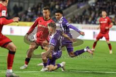 3. Liga; VfL Osnabrück - FC Ingolstadt 04; Zweikampf Kampf um den Ball Marcel Costly (22, FCI) Christensen Frederik (3 VFL) Wiethaup Kevin (19 VFL)