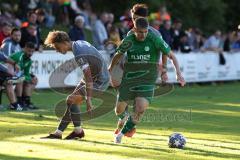 Totopokal- Saison 2023/2024 - SV Manching  - VFB Eichstätt - Sebastian Graßl (Nr.10 - SV Manching) - Herger Elias grau #11 Eichstätt - Foto: Meyer Jürgen