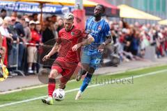 3. Liga; Testspiel; FC Ingolstadt 04 - 1. FC Heidenheim; Zweikampf Kampf um den Ball Linus Rosenlöcher (19, FCI) Traoré Omar Haktab (23 HDH)