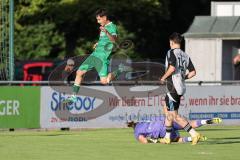Bezirksliga - Saison 2025/26 - FC Gerolfing - TSV Ober./Unterh.stadt - Ahmet Altay grün Gerolfing  - Torwart Ali Cakmakci (Nr.1 - TSV Ober-/Unterh.stadt) - David Romanov (Nr.14 - TSV Ober-/Unterh.stadt) Foto: Meyer Jürgen