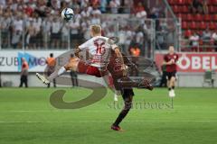 Toto-Pokal - Saison 2023/2024 - FC Ingolstadt 04 - Jahn Regensburg - Louis Breunig (Nr.16 - Regensburg) - Daouda Beleme (Nr.9 - FCI) - Foto: Meyer Jürgen