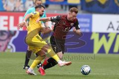 3.Liga - Saison 2023/2024 - FC Ingolstadt 04 -  1. FC Saarbrücken - Jannik Mause (Nr.7 - FCI) - Kasim Rabihic (Nr.10 - Saarbrücken) - Foto: Meyer Jürgen