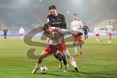 3. Liga; SSV Jahn Regensburg - FC Ingolstadt 04; Zweikampf Kampf um den Ball Julian Kügel (29, FCI) Schönfelder Oscar (7 SSV)