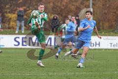 Landesliga - Saison 2025/26 - SV Manching - VFB Durach - Fabian  Neumayer (Nr.9 - SV Manching) - Nosdrin Marc blau Durach  - Foto: Meyer Jürgen