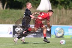 Kreisklasse - Saison 2023/2024 -SV Zuchering - SV Oberstimm - Stefan Frank schwarz Oberstimm - Philip Delanowski rot Zuchering - Foto: Meyer Jürgen