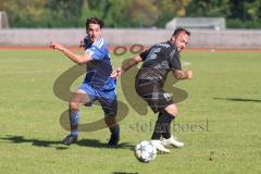 Kreisklasse - Saison 2025/26- TSV Ingolstadt Nord - FC Arnsberg - Marco Meier blau Arnsberg - Valjdrin Stafa schwarz Ing.Nord - Foto: Meyer Jürgen