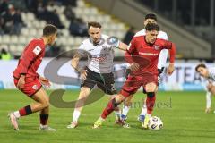 3. Liga; SSV Ulm - FC Ingolstadt 04; Zweikampf Kampf um den Ball Dennis Kaygin (10, FCI) Pepic Mirnes (20 Ulm) Marcel Costly (22, FCI) El-Zein Abu-Bekir (26 Ulm) hinten