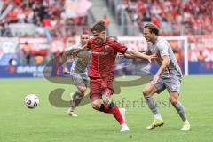 3. Liga; FC Ingolstadt 04 - SSV Jahn Regensburg; Zweikampf Kampf um den Ball Frederik Christensen (11, FCI) Strauss Felix (4 SSV)