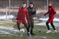 3. Liga - Saison 2025/26 - FC Ingolstadt 04 - Trainingsauftakt nach der Winterpause - Christensen Gustav (Nr.24 - FCI) - Jannick Schmidt (FCI) - Foto: Meyer Jürgen