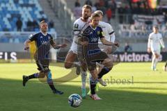 2024_1_27 - 3. Liga - Saison 2023/24 - 1. FC Saarbrücken - FC Ingolstadt 04 -  - Yanick Deichmann (Nr.20 - FC Ingolstadt 04) - Marcel Gaus (Nr.19 - 1. FC Saarbrücken) - Foto: Meyer Jürgen