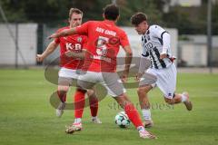 Bayernliga Nord - Saison 2026/27 - FC Ingolstadt 04 II - ASV Cham - Timo Hengmith (Nr.10 - FCI II) - Lukas Leutner rot Cham #15 - Michael Lamecker rot Cham #5 - Foto: Meyer Jürgen