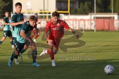 Bayernliga Nord - Saison 2023/2024 - FC Ingolstadt 04 - SSV Jahn Regensburg - Leon Nuhanovic rot FCI - Luis Bezjak grün Regensburg - Foto: Meyer Jürgen