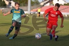 Bayernliga Nord - Saison 2023/2024 - FC Ingolstadt 04 - SSV Jahn Regensburg - Moritz Wiezorrek (Nr.15 - FCI U21) - Luis Bezjak grün Regensburg - Foto: Meyer Jürgen