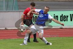 Kreisklasse -  Saison 2023/2024 - DJK Ingolstadt - FC Tegernbach - Tobias Hagl rot Tegernbach - Isa Gashi blau DJK Ingolstadt - Foto: Meyer Jürgen