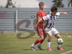 Bayernliga Nord - Saison 2026/27 - FC Ingolstadt 04 II - Jahn Regensburg II - Damian Coric (Nr.8 - FCI II) - Henrik Heid rot Regensburg - Foto: Meyer Jürgen