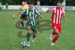 Landesliga - Saison 2025/26 - SV Manching - TSV Dachau  - Fabian  Neumayer (Nr.9 - SV Manching) - Sebastian Mitterhuber rot Dachau - Foto: Meyer Jürgen