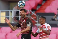 Toto-Pokal - Saison 2023/2024 - FC Ingolstadt 04 - Jahn Regensburg - Lukas Fröde (Nr.34 - FCI) - Bryan Hein (Nr.3 - Regensburg) - Foto: Meyer Jürgen