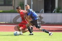 Testspiel - Bezirksliga - Saison 2025/26 - FC Fatih Ingolstadt - TSV Burgheim - Aaron Toski rot Fatih - Florin Horoba blau Burgheim - Foto: Meyer Jürgen