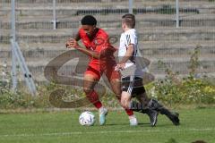 Bayernliga Nord - Saison 2023/2024 - FC Ingolstadt 04 - FC Coburg - David Udogu rot FCI - Adrian Guhling weiss Coburg - Foto: Meyer Jürgen