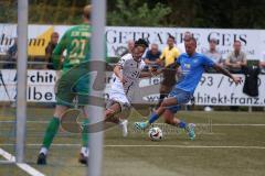 Toto - Pokal - Saison 2024/25 - DJK Hein - FC Ingolstadt 04 -  - Özden Mustafa (Nr.21 - FCI) - Matthias Fries (Nr.7 - DJK Hain) - Luca Kühnl (Nr.21 - DJK Hain) - Foto: Meyer Jürgen