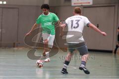 Hallenturnier Ingolstadt Nord - Saison 2024/25 - MBB SG MAnching - FC Fatih Ingolstadt  - Mert Karatas grün Fatih - Julian Lettenbauer weisss Manching - Foto: Meyer Jürgen