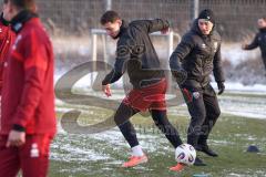 3. Liga - Saison 2025/26 - FC Ingolstadt 04 - Trainingsauftakt nach der Winterpause - Jonas Scholz (Nr.15 - FCI) - Jannick Schmidt (FCI) - Foto: Meyer Jürgen