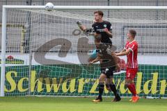 3.Liga - Saison 2022/2023 - SC Freiburg II - FC Ingolstadt 04 -  Torwart Marius Funk (Nr.1 - FCI) klärt mit einer Faustabwehr - Calvin Brackelmann (Nr.17 - FCI) - Andi Hotti (Nr.3 - SC Freiburg II) - - Foto: Meyer Jürgen