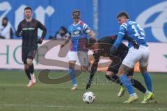 3. Liga - Saison 2025/26 - Hansa Rostock - FC Ingolstadt 04  - Dennis Kaygin (Nr.10 - FCI) - Jan Mejdr (Nr.19 - Hansa Rostock) - Foto: Meyer Jürgen