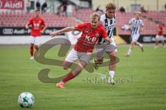 Bayernliga Nord - Saison 2026/27 - FC Ingolstadt 04 II - ASV Cham - Manuel Distl (Nr.9 - FCI II) - Felix Voigt rot Cham - Foto: Meyer Jürgen