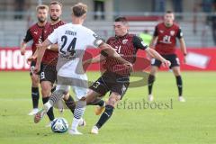 3.Liga - Saison 2023/2024 - SC Verl - FC Ingolstadt 04 - Felix Keidel (Nr.43 - FCI) - Michel Stöcker (Nr.24 - Verl) -  - Foto: Meyer Jürgen