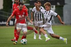 Bayernliga Nord - Saison 2026/27 - FC Ingolstadt 04 II - ASV Cham - Manuel Distl (Nr.9 - FCI II) - Simon Haimerl rot Cham - Foto: Meyer Jürgen