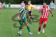 Landesliga - Saison 2025/26 - SV Manching - TSV Dachau  - Fabian  Neumayer (Nr.9 - SV Manching) - Sebastian Mitterhuber rot Dachau - Foto: Meyer Jürgen