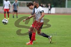 Bezirksliga - Saison 2024/25 -  Emre Arik weiss Fatih - Moritz Haile grau Feldmoching - Foto: Meyer Jürgen