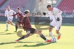 Testspiel; 1. FC Nürnberg - FC Ingolstadt 04 - Zweikampf Kampf um den Ball Jander Caspar (20 FCN) Benjamin Kanuric (8, FCI)