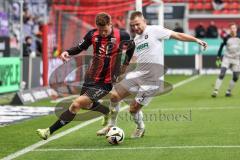 3. Liga; FC Ingolstadt 04 - Erzgebirge Aue; Sebastian Grönning (11, FCI) Vukancic Niko (4 Aue) Zweikampf Kampf um den Ball