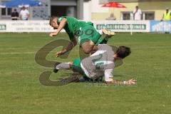 Bezirksliga - Saison 2024/25 - SV Manching - TSV Jetzendorf - Sebastian Graßl (Nr.10 - SV Manching) - Lorenz Kirmair weiss Jetzendorf - Foto: Meyer Jürgen