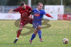 Kreisliga - Saison 2025/26- TSV Kösching - SV Zuchering - Jonas Betz blau Kösching - Marcel Preuß rot ZUchering - Foto: Meyer Jürgen