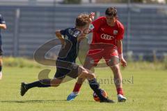 A - Junioren Bundesliga -  Saison 2023/2024 - FC Ingolstadt 04 - FSV Mainz 05 - Ognjen Draculic rot FCI - Jason Amann Mainz - Foto: Meyer Jürgen