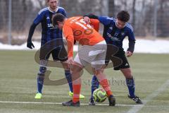 Schanzer Amateurcup 2026 - SV Haunwöhr - SC Irgertsheim - Pascal Mundil blau Haunwöhr - David Lecher meier orange Irgertsheim - Foto: Meyer Jürgen