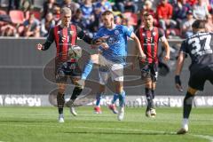 3. Liga; FC Ingolstadt 04 - FC Hansa Rostock; Zweikampf Kampf um den Ball Dennis Borkowski (7, FCI) Neidhart Nico (7 HR)