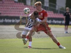 Bayernliga Nord - Saison 2026/27 - FC Ingolstadt 04 II - Jahn Regensburg II - Can Paylan (Nr.6 - FCI II) - Raphael Steudtner rot Regensburg - Foto: Meyer Jürgen