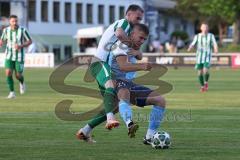Landesliga - Saison 2025/26 - SV Manching - SV Cosmos Aystetten - Maximilian Eberwein (Nr.4 - SV Manching) - Kevin Makowski blau Aystetten - Foto: Meyer Jürgen