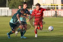 Bayernliga Nord - Saison 2023/2024 - FC Ingolstadt 04 - SSV Jahn Regensburg - Leon Nuhanovic rot FCI - Luis Bezjak grün Regensburg - Foto: Meyer Jürgen