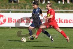 Kreisliga - Saison 2025/26- TSV Kösching - TV Münchsmünster - Andre Bräuning blau Münchsmünster - Jonas Betz rot Kösching - Foto: Meyer Jürgen