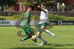 Bezirksliga - Saison 2024/25 - SV Manching - TSV Jetzendorf - Stefan Müller (Nr.7 - SV Manching) - Bryan Beyreuther weiss Jetzendorf - Foto: Meyer Jürgen