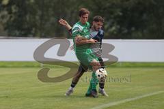 Bezirksliga - Saison 2025/26 - TSV Ober./Unterhaunstadt - SVA Palzing - Atem Husejnovic  (Nr.9 - TSV Ober-/Unterh.stadt) - Marcel Radlmaier grün Palzing - Foto: Meyer Jürgen